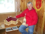 Mr. Benda receiving his house model
